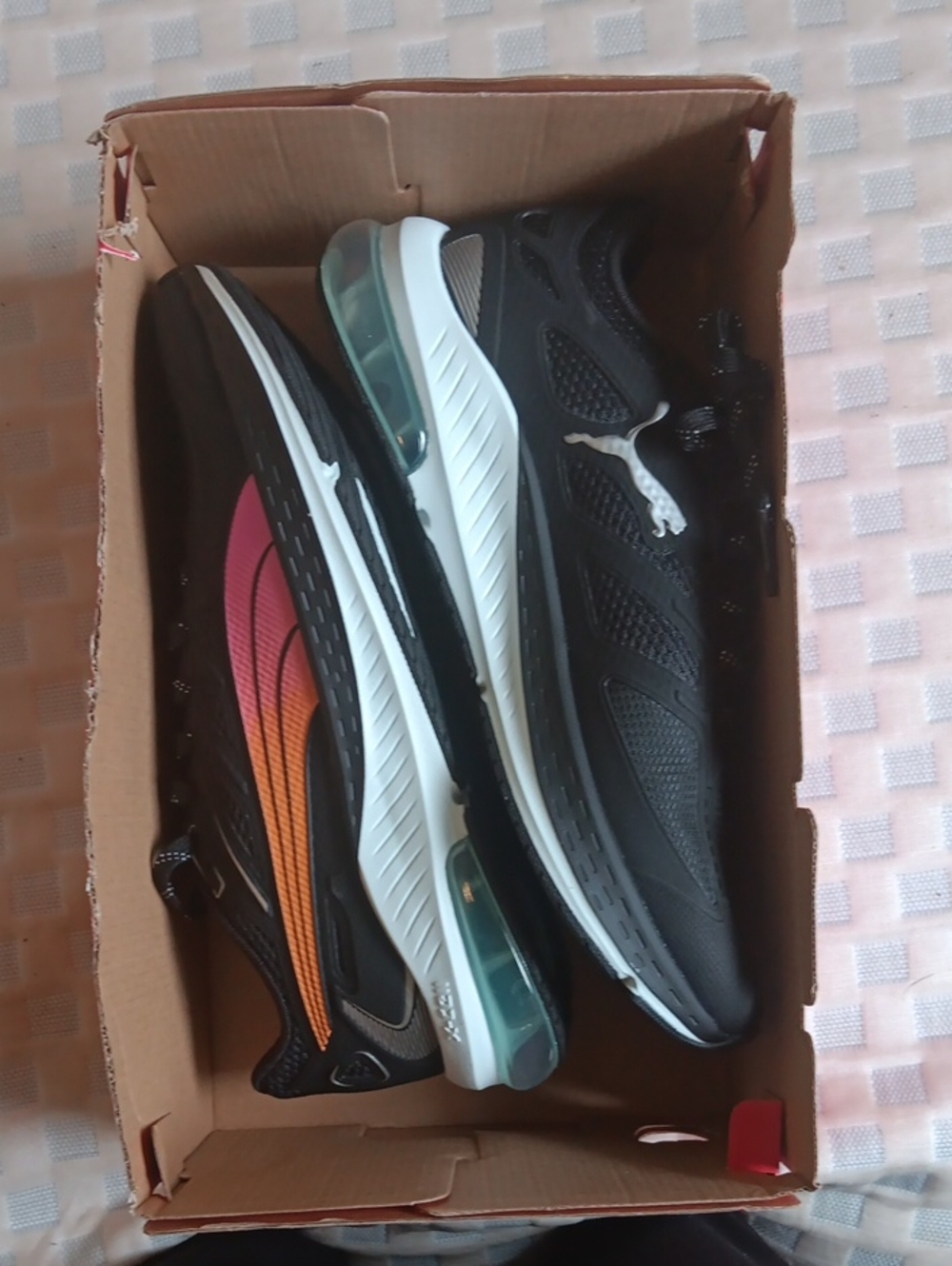 Puma Women's Black Sneakers with Pink-to-Orange Gradient Accent